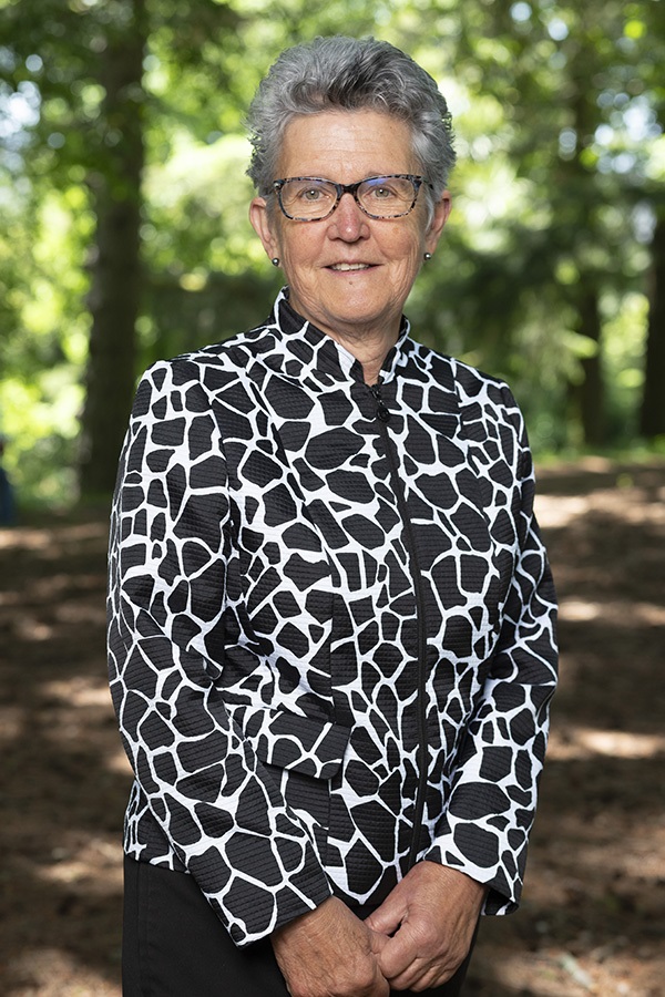 Cr Lesley Hewitt standing in the Wombat Hill Botanic Gardens