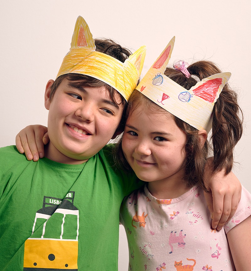 Two children with crown headbands